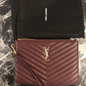 Maroon Saint Laurent Wristlet. Unused. NWT